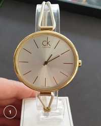 Oryginalny zegarek damski Calvin Klein złoty na rzemyku K3V235L6