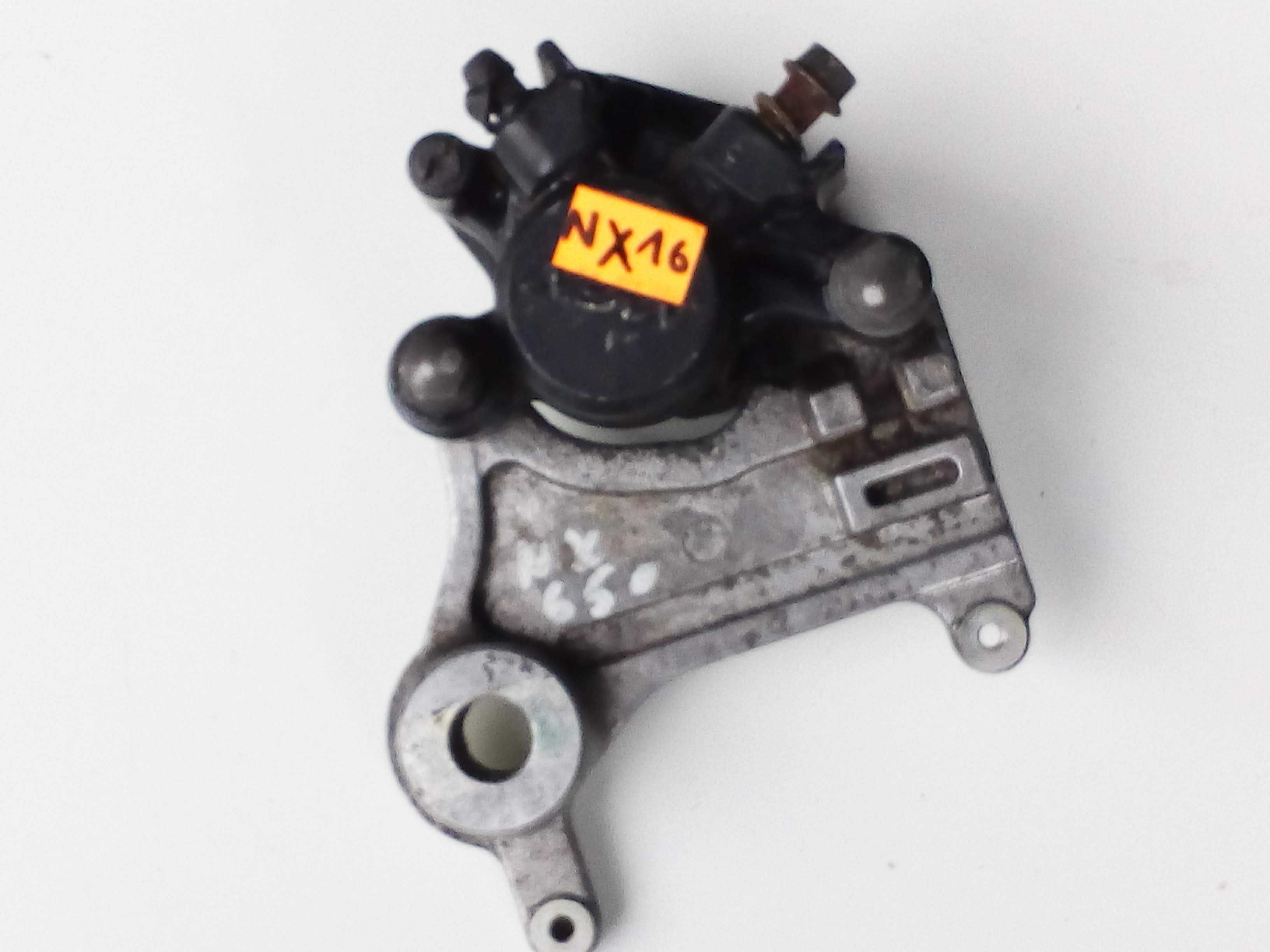 Honda nx 650 dominator zacisk hamulcowy