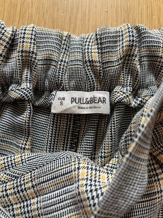 Spodnie eleganckie chinosy w kratę Pull&Bear