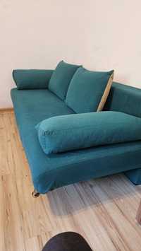 Rozkładana sofa zielona