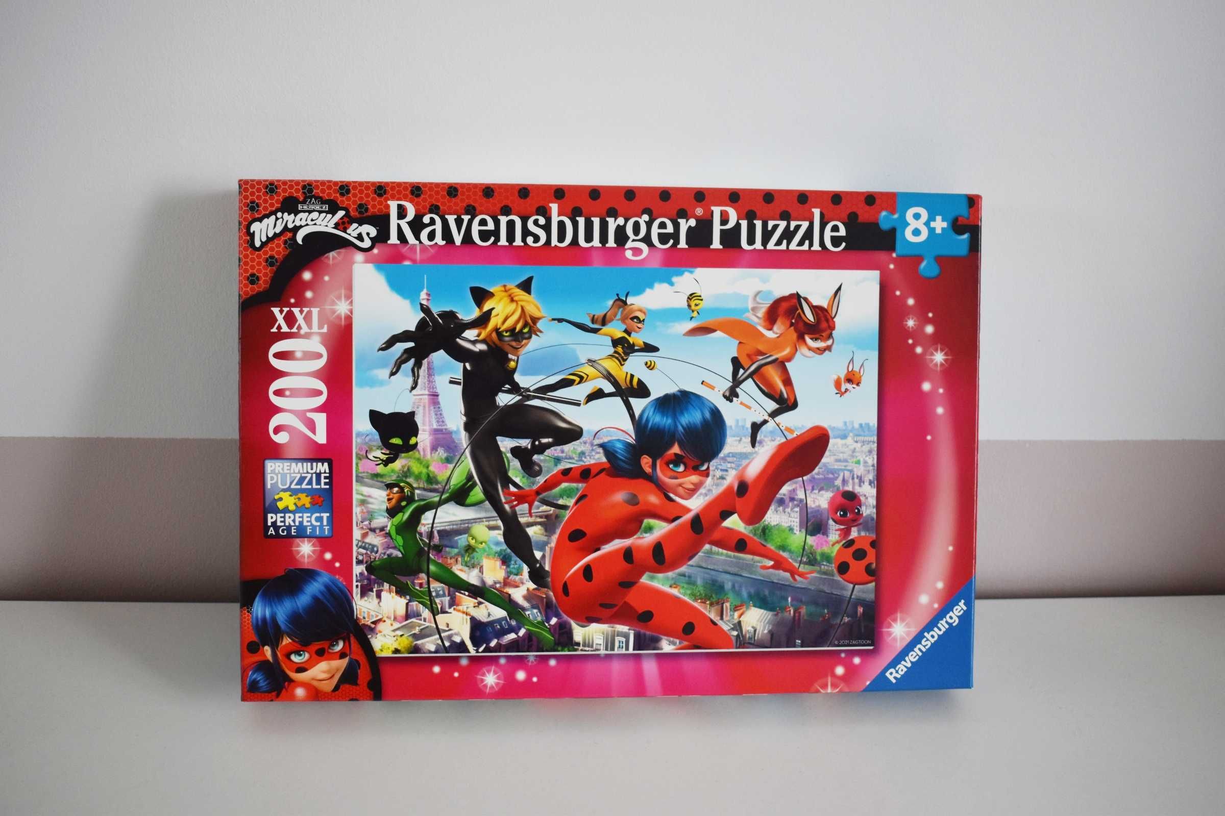 Ravensburger Puzzle Miraculum 200 XXl Biedronka i Czarny Kot