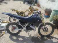 Suzuki RMX 50 uma com docs outra sem