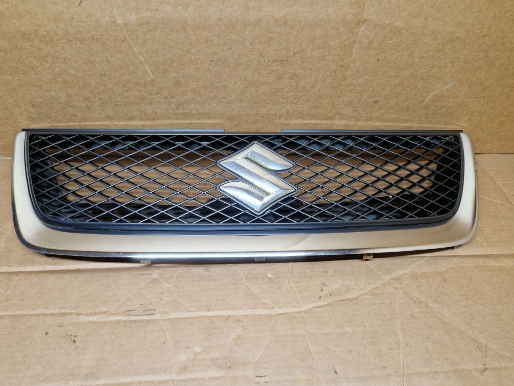Grill atrapa zderzaka emblemat Suzuki Grand Vitara II kolor ZDL