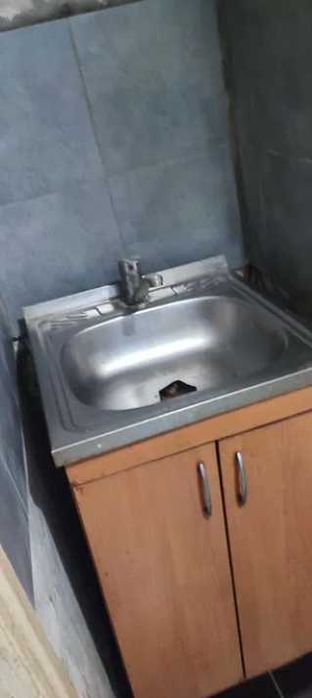 Продам кирпичный Дом на поселке  Строителей в городе Каменское.