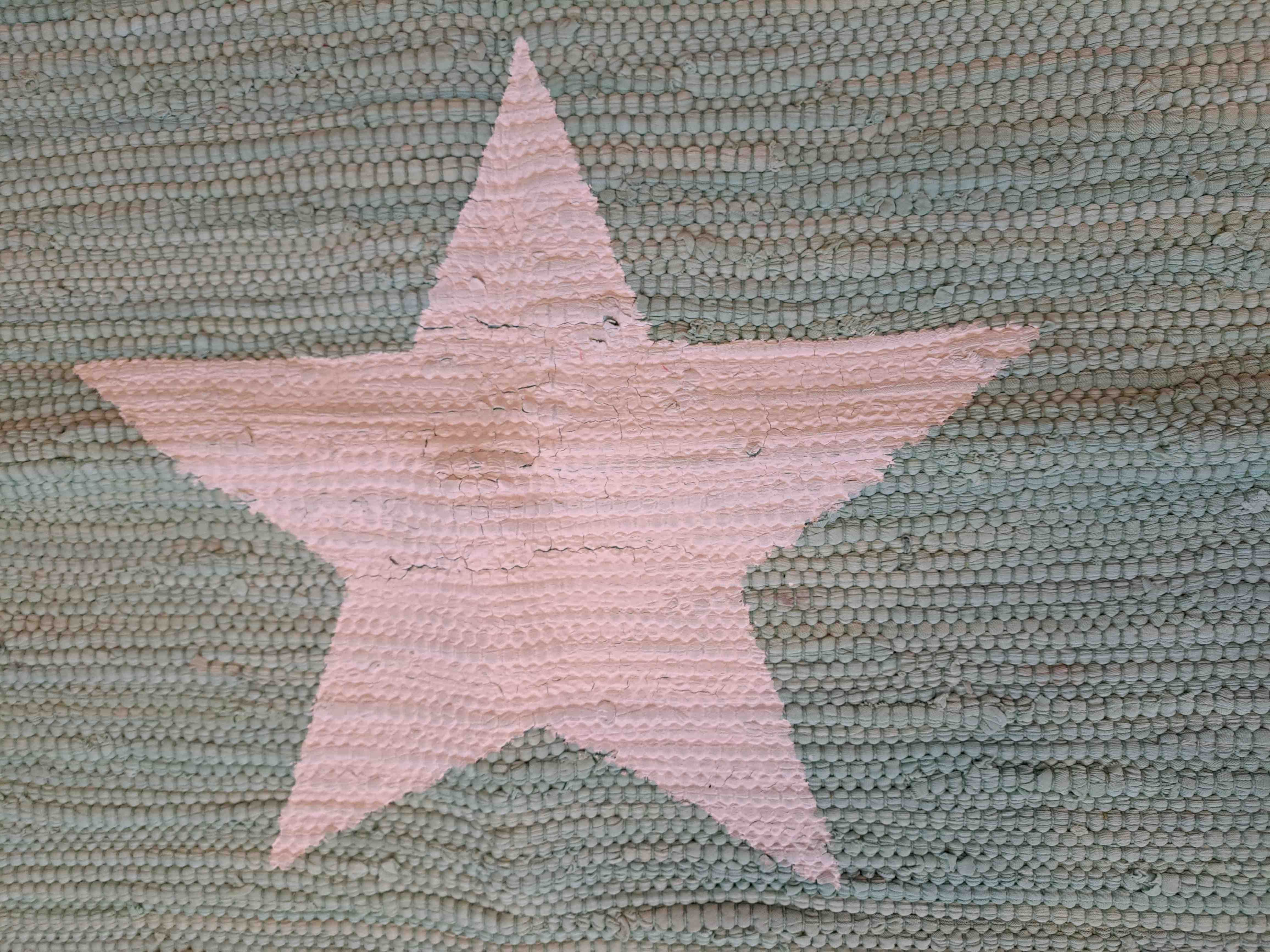 Ozdobny dywanik z motywem gwiazdy