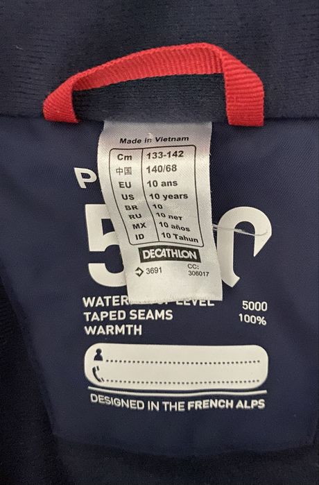 Granatowa sportowa kurtka śnieg  narty sanki Decathlon wedze 131 142