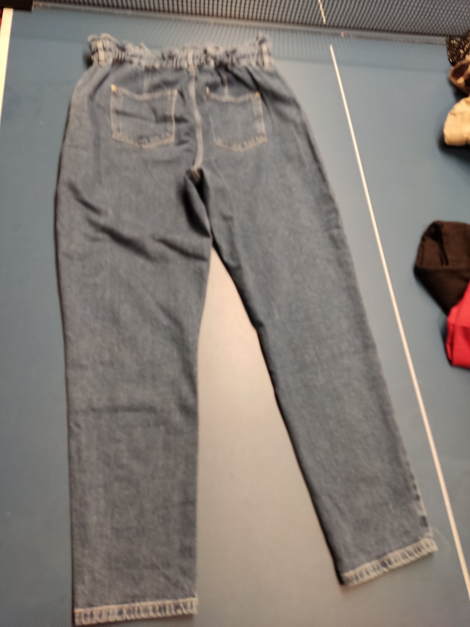 Spodnie jeans firma Orsay rozmiar 44 jak nowe