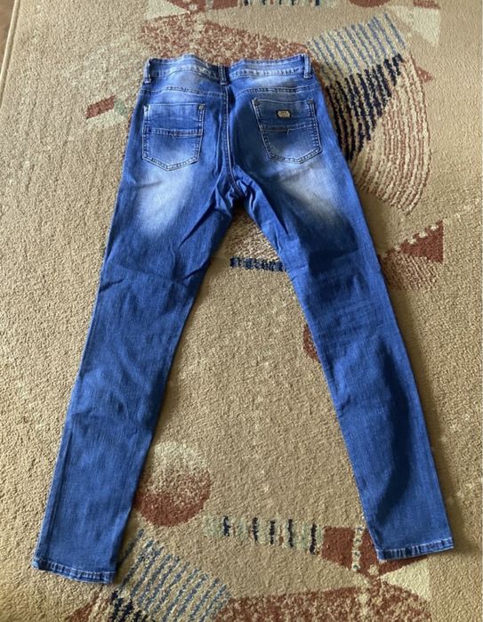 Джинсы женские