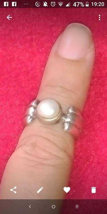 Anel, anos 90, de Prata contrastada com pérola falsa.