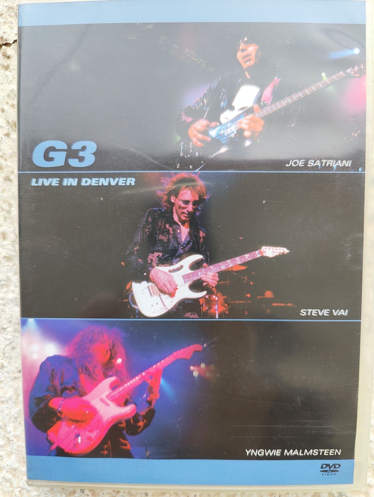 DVD concerto G3 - live in Denver. Satriani, Steve Vai and Malmsteen