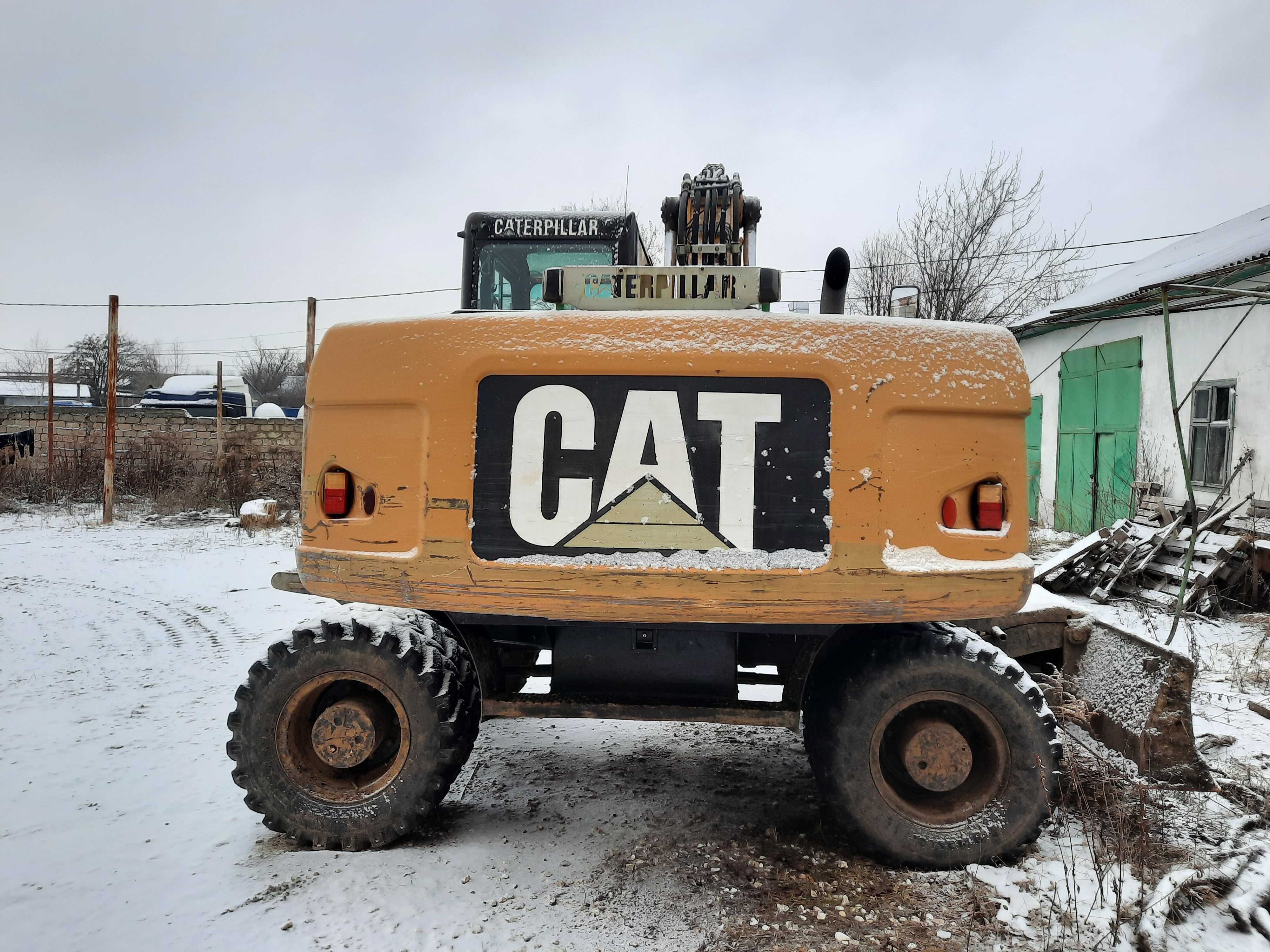 Екскаватор колісний САТ 318D