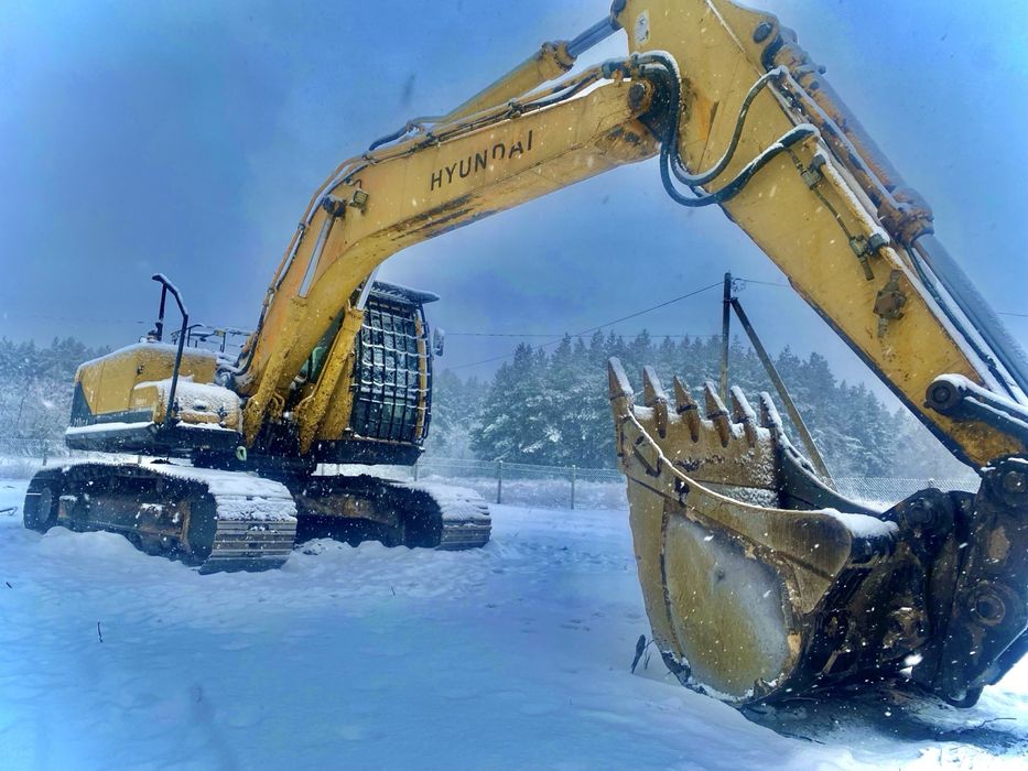 Услуги гусеничного экскаватора с гидромолотом.