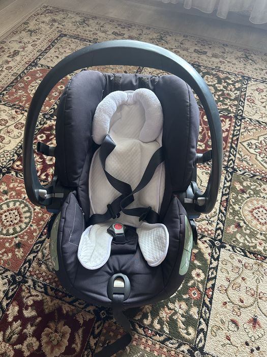 Автокресло люлька с 0+ Stokke