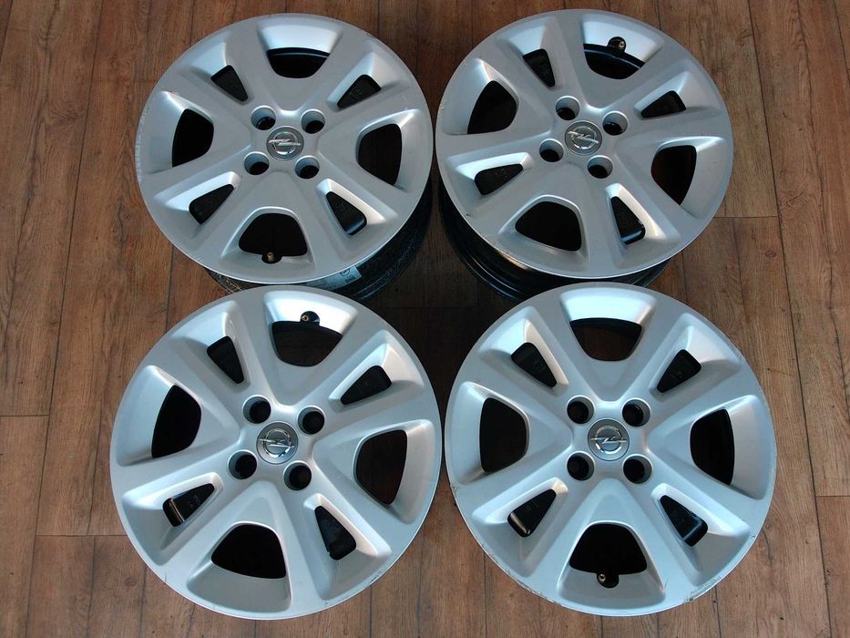Felgi strukturalne Opel Adam Corsa D Karl 15 4x100 ET50 kołpak czujnik