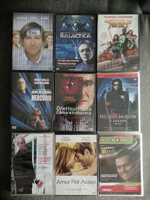 34 DVs originais. 23 ainda estão com plástico