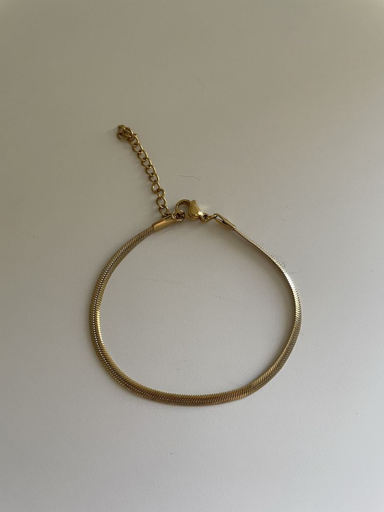 Pulseira de malha dourada