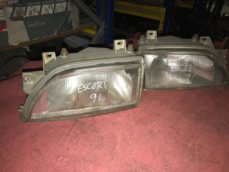 Óticas / faróis da frente ford escort