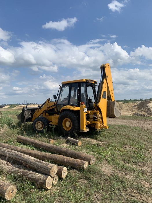 Послуги екскаватора-навантажувача