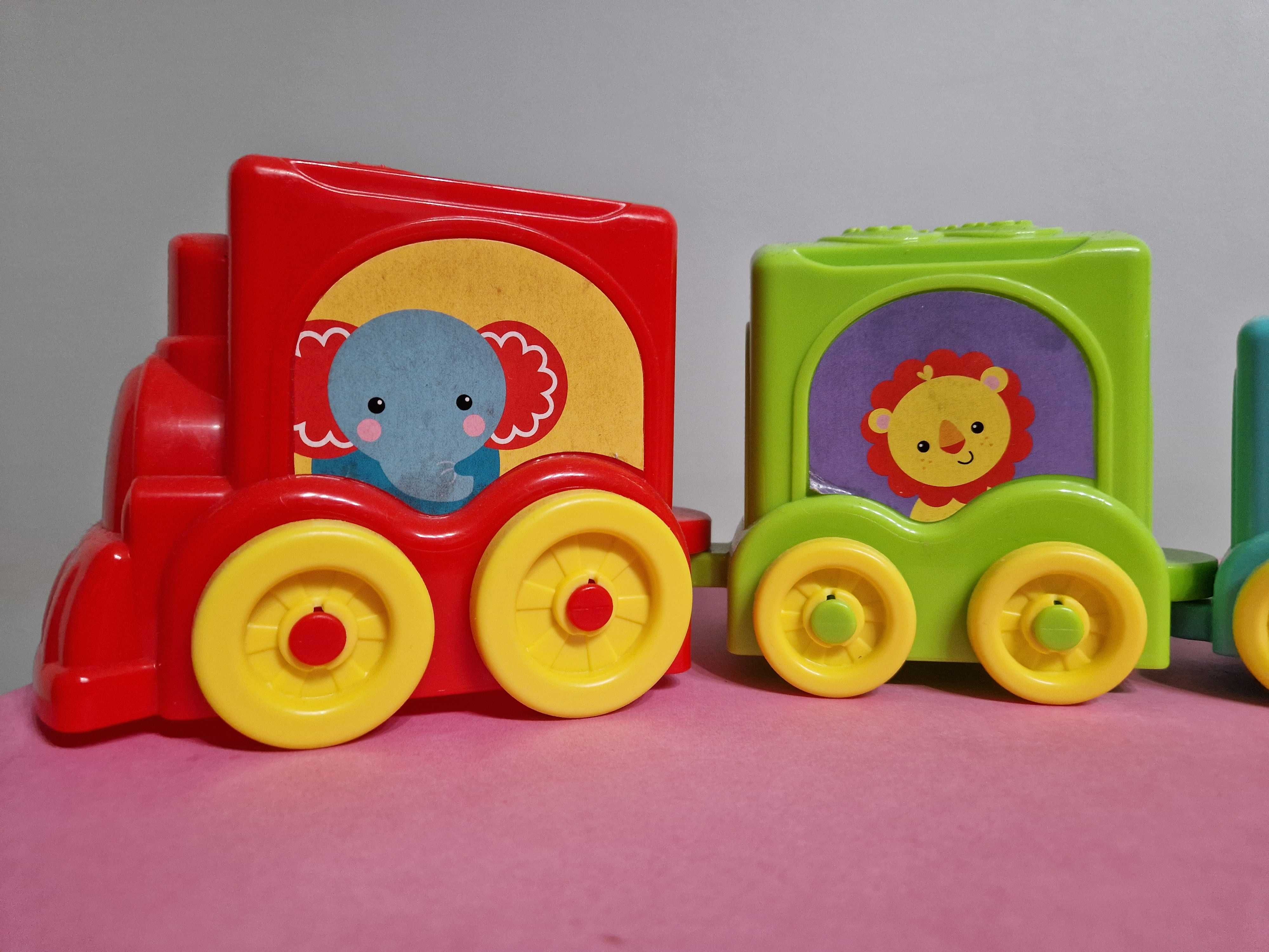 Pociąg wagony wieża cyfry piramida kolory Fisher Price