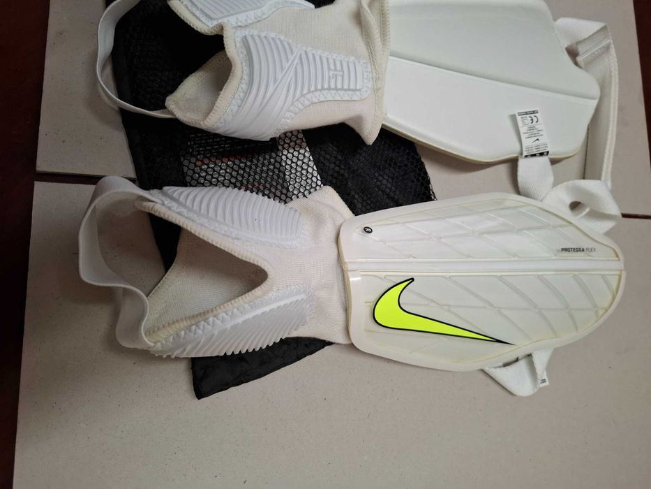 Caneleiras Nike como novas junior