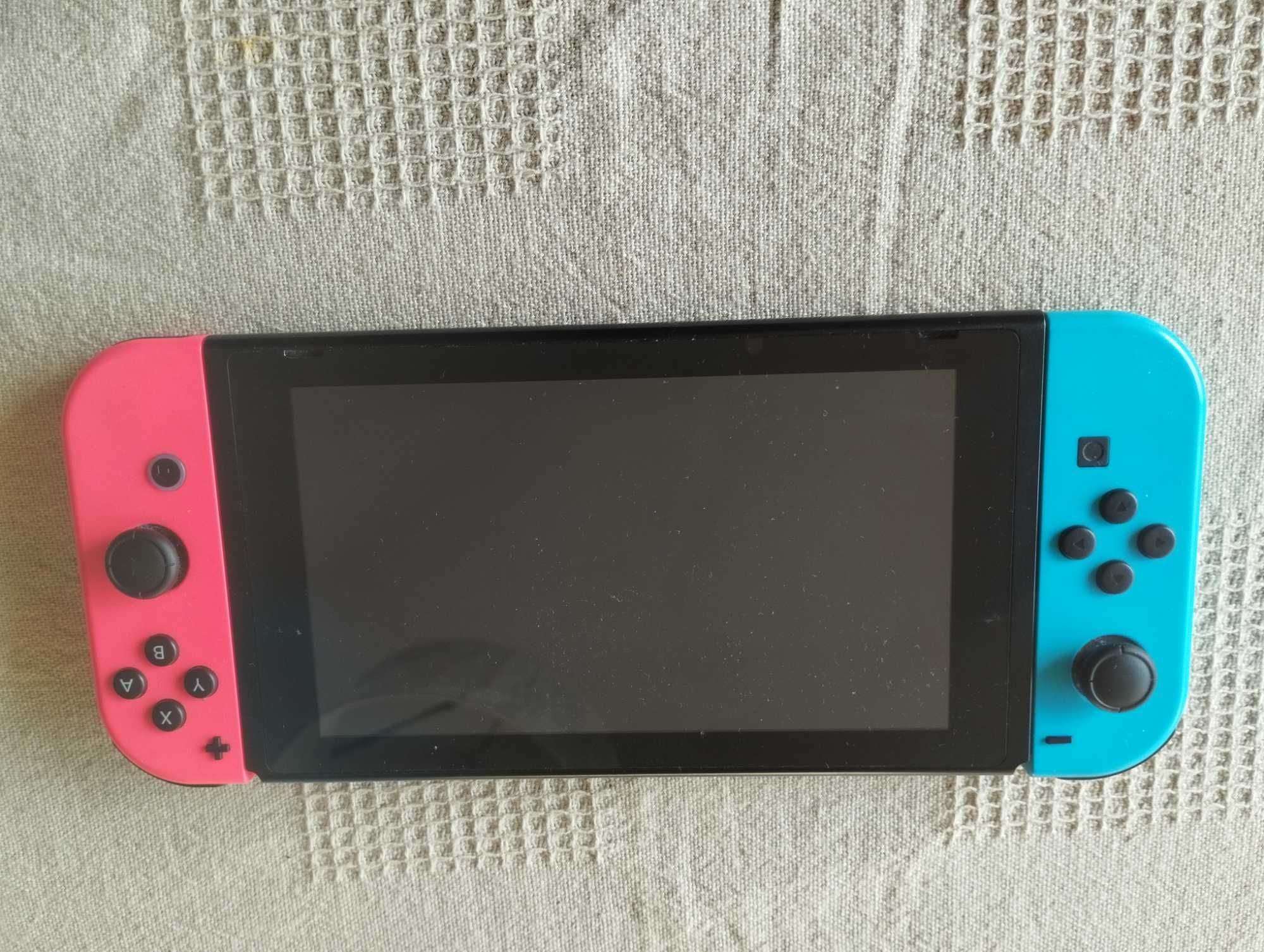 Nintendo Switch com vários acessórios