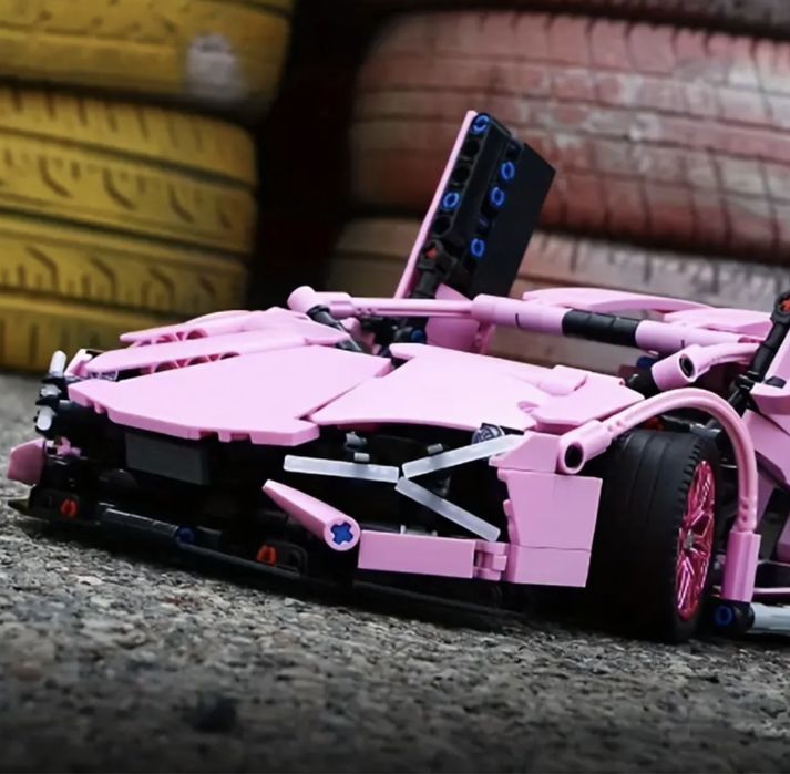 Контсруктор 1300 дет спортивна машина 36*17см lego technic рожева