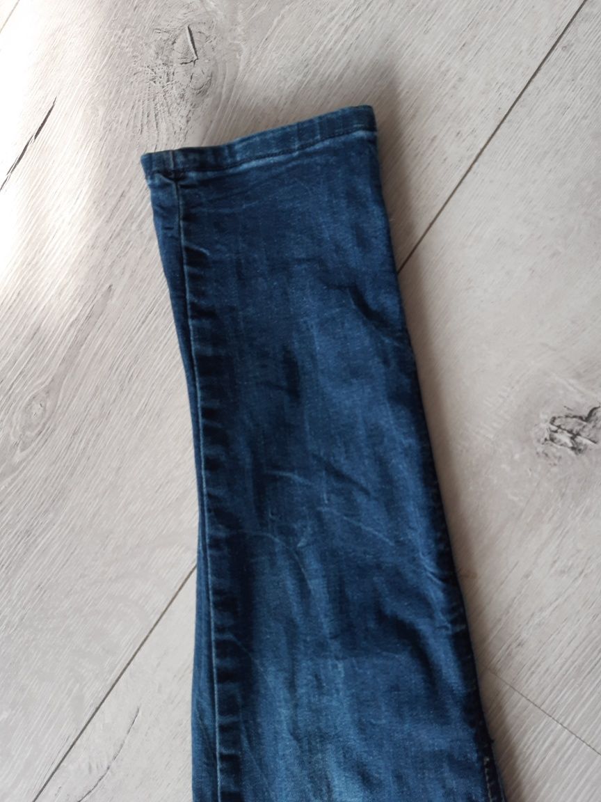 Przecierane spodnie jeans w rozmiarze L