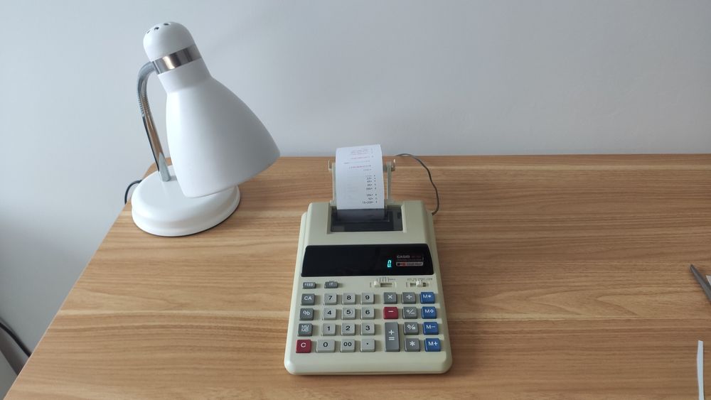 Kalkulator drukujący Casio + zasilacz