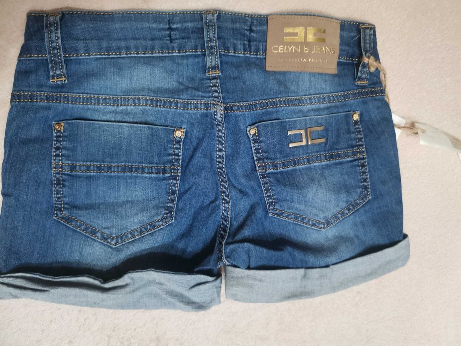 Джинсові короткі шорти з підворотом