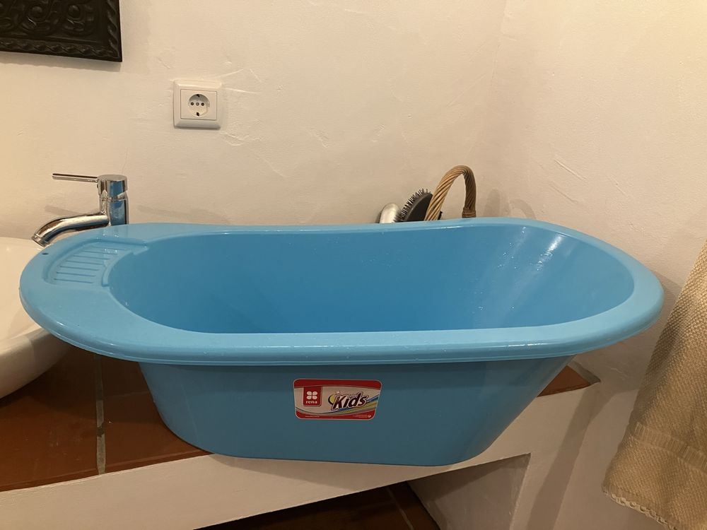Cama viagem e banheira