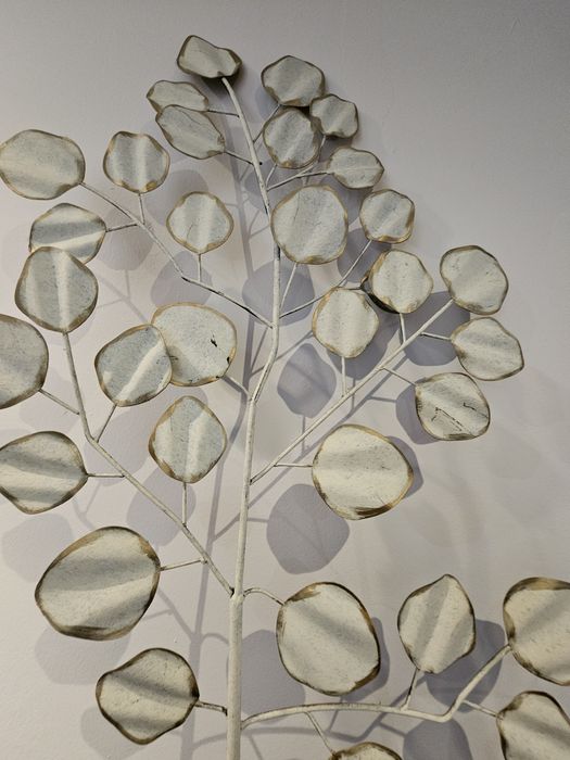 Peça decorativa parede loja Area