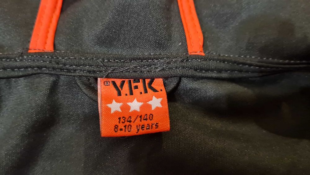 Pomarańczowa kurtka softshellowa rozmiar 134/140