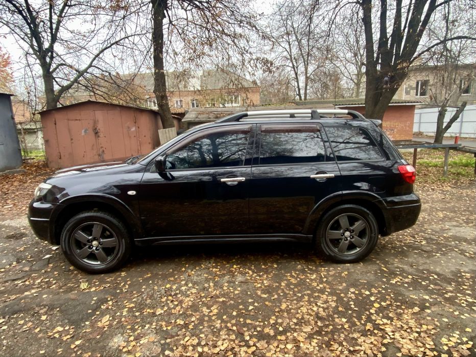 митсубиси Аутлендер 2.4 газ бензин автомат