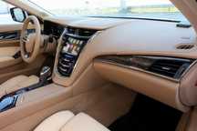Интерьер Cadillac CTS 2014: панель, обшивка, ремни, коврики