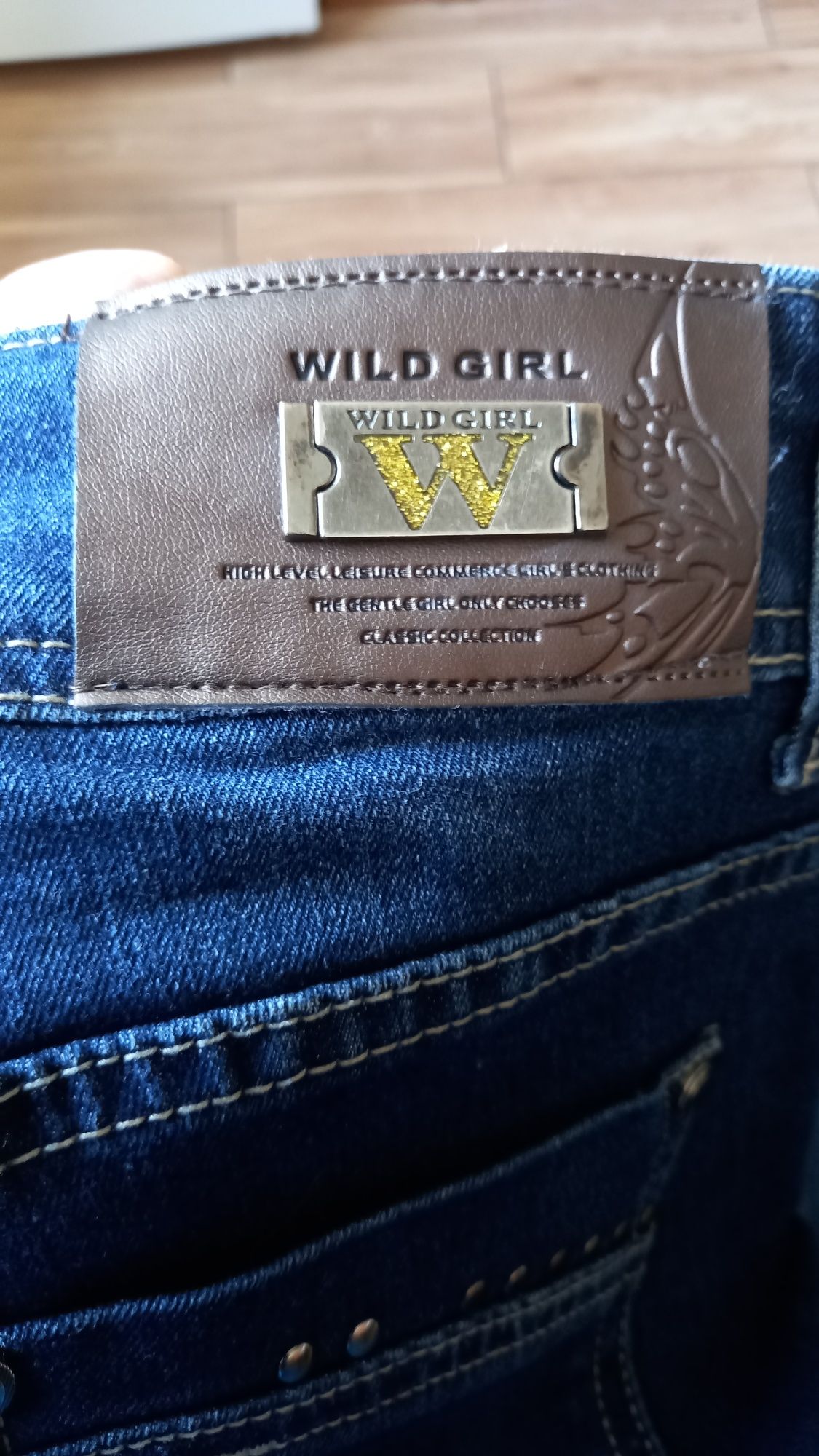 Spodnie damskie biodrówki rozmiar XL  Wild