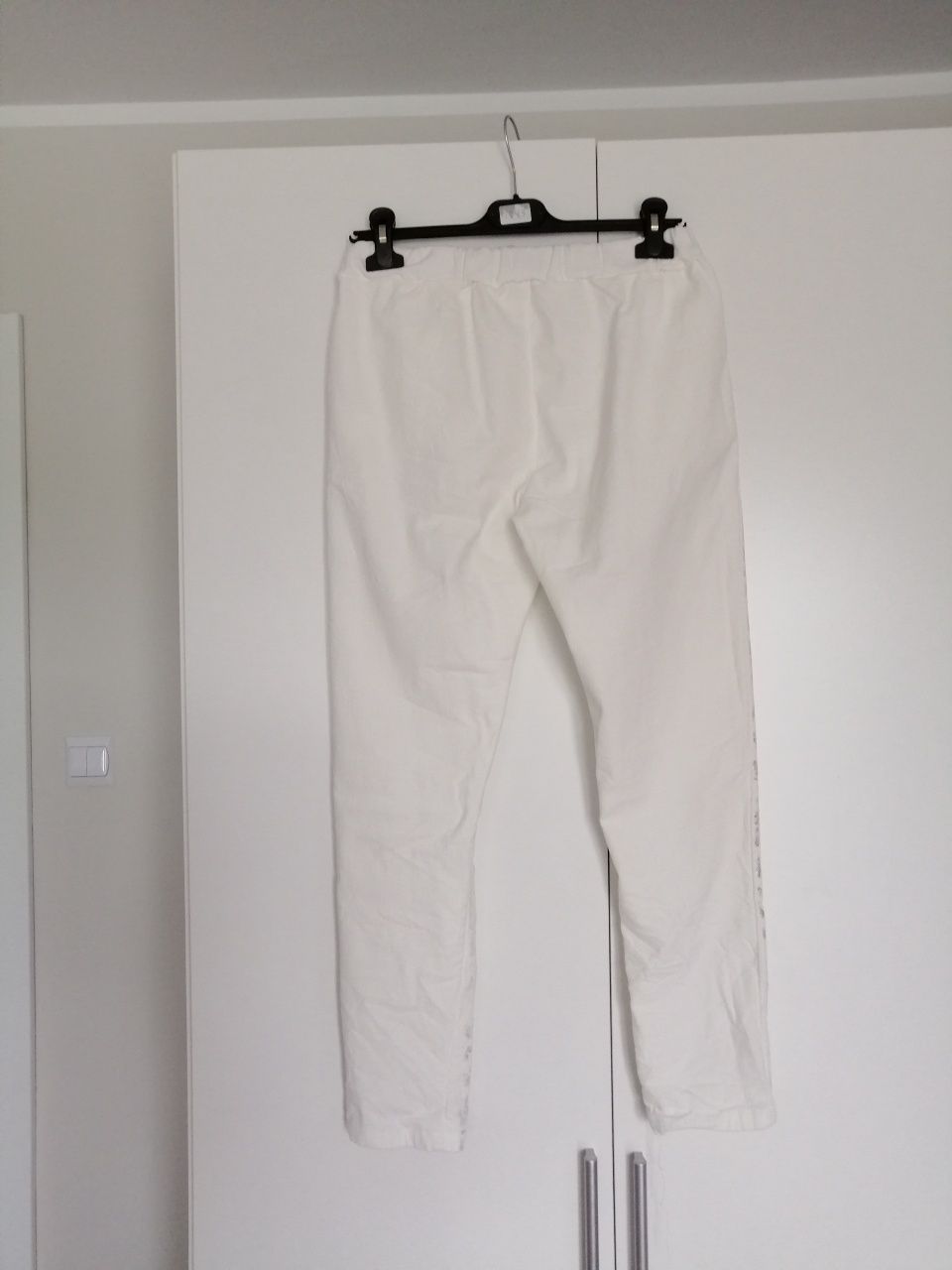 Nowe Białe spodnie z srebrnym połyskiem L xl na lato boho wiskoza uni