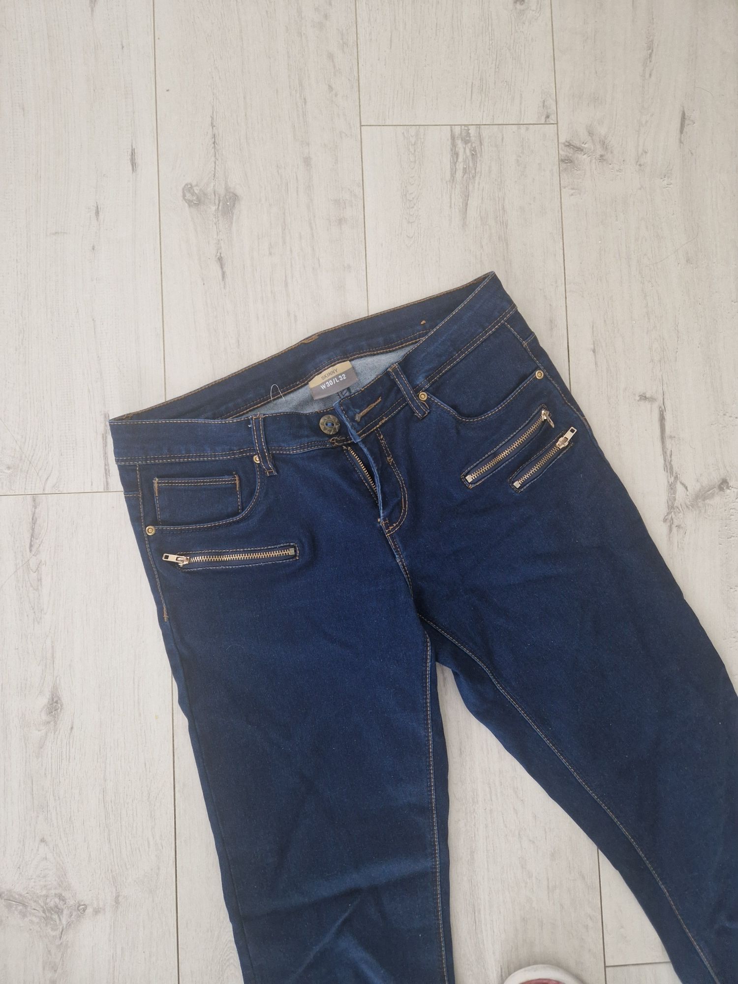 Ciemne dzinsy rurki skinny Takko fashion 30/32