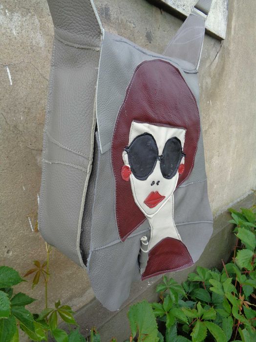 Artystyczna torebka skórzana z głową kobiety. Handmade