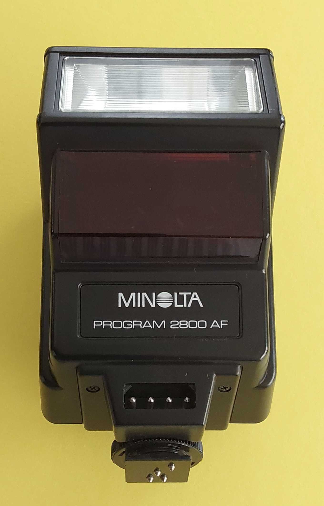 Máquina Minolta 7000 e objetiva 50; Flash 2800; Zoom 70-210
