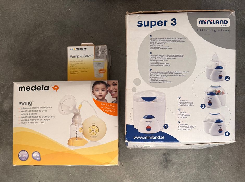 Medela extrator de leite e esterilizador de biberões.
