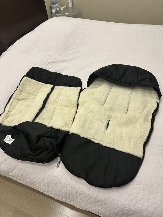 Зимовий конверт в прогулянкову коляску на овчині