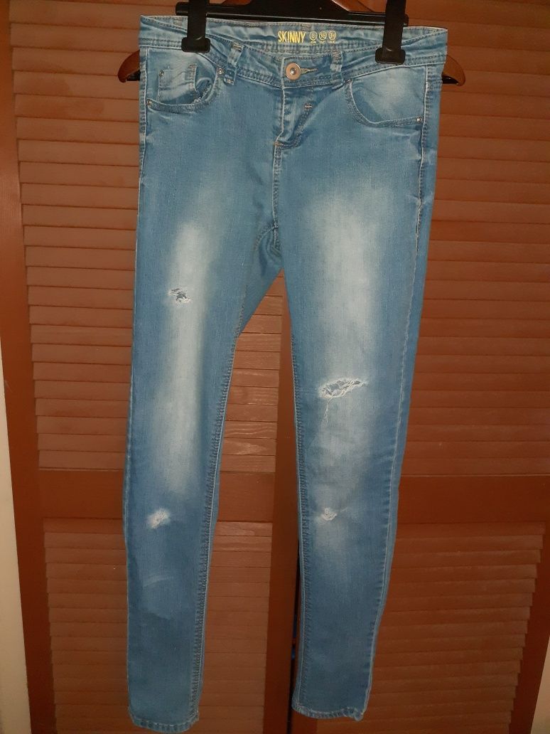 Spodnie jeans skinny dziury