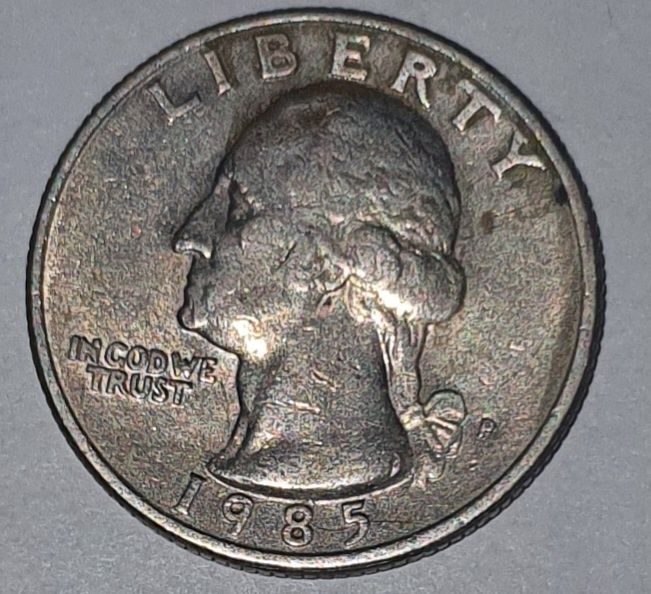Moneta 25 cent 1985 P. (USA).