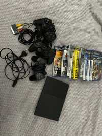 PlayStation 2 com consola e jogos juntos