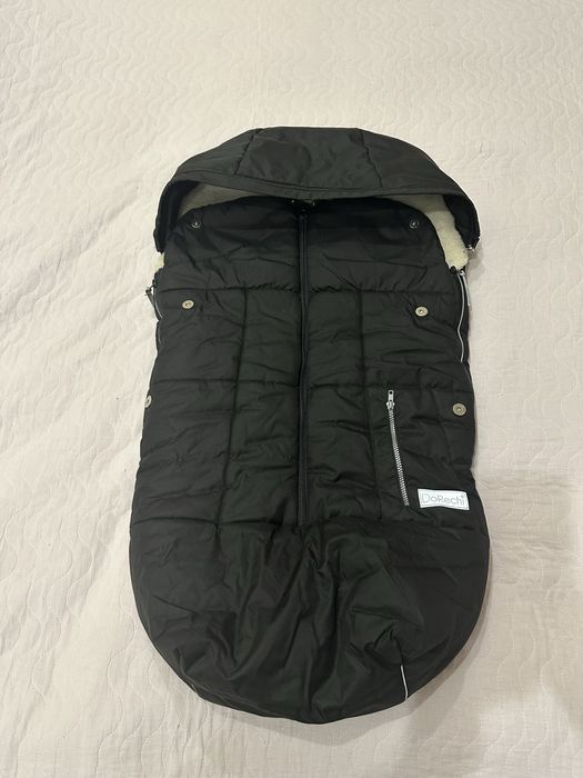 Зимовий конверт в прогулянкову коляску на овчині