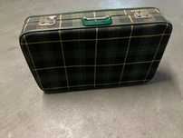 Mala vintage em tom de verde