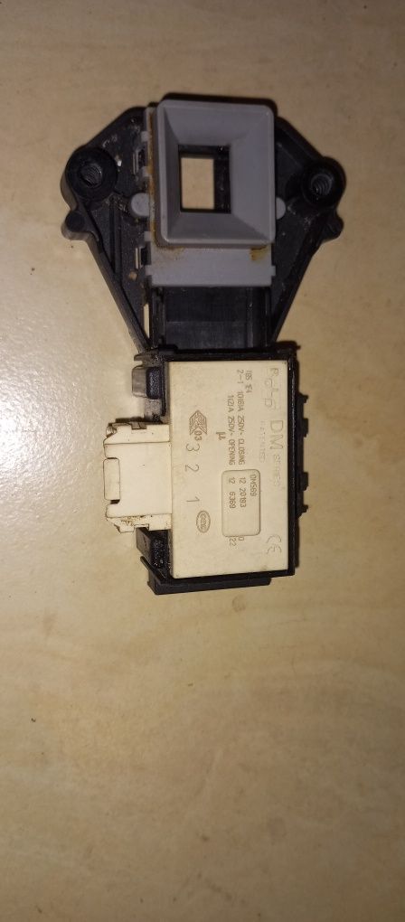 Zamek drzwiczek pralki Whirlpool dm series Rold DM569 blokada drzwi ry