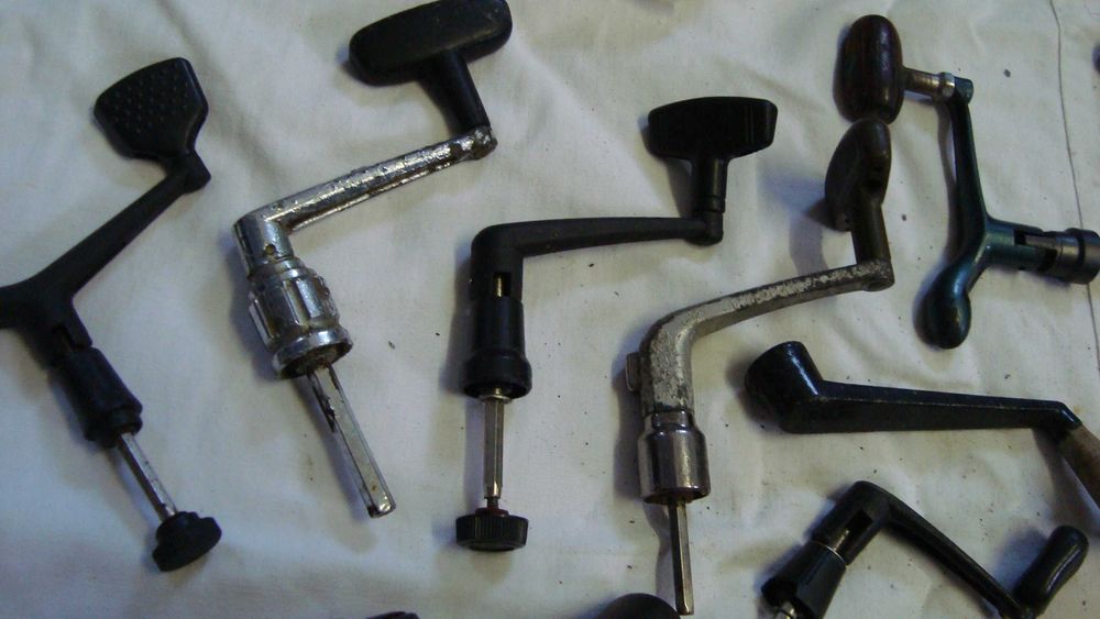 Material   para  pesca,  carretes  usados