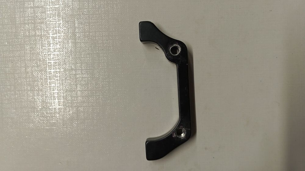 Adapter hamulca tarczowego 160/180mm
