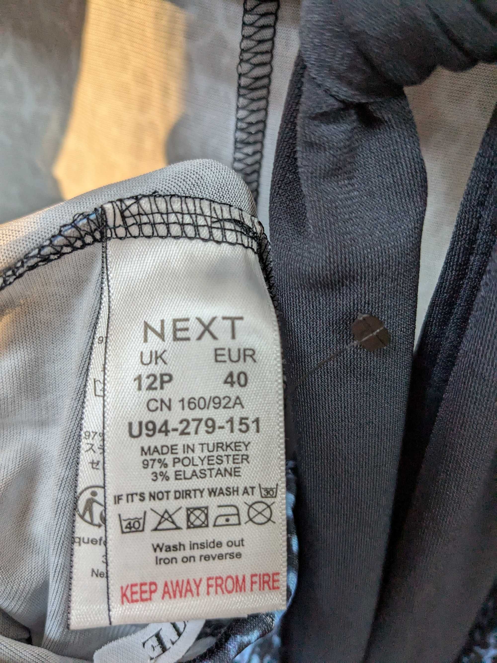 Next kombinezon elastyczny w panterkę rozm. 40